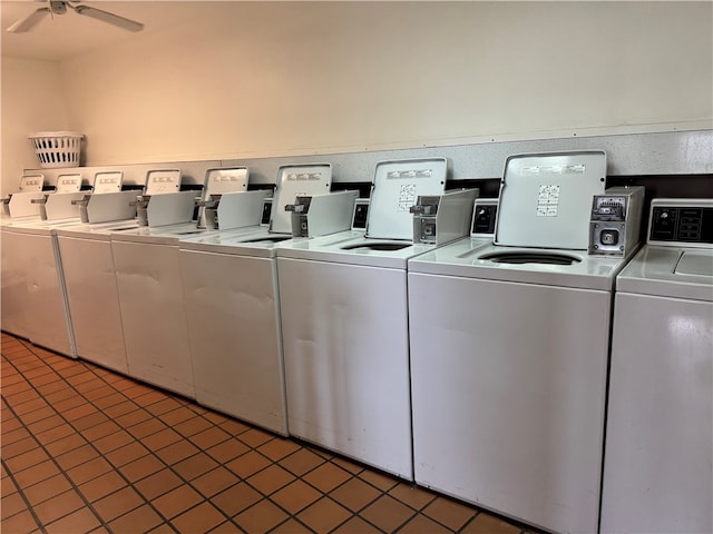 clothes washing area featuring ceiling fan, dark tile patterned floors, and separate washer and dryer