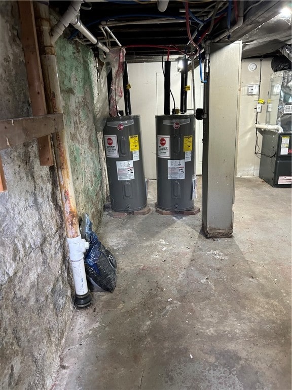 basement featuring heating unit and water heater