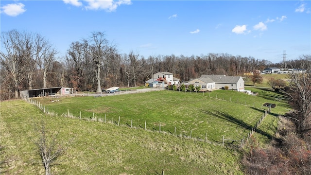 view of yard with a rural view