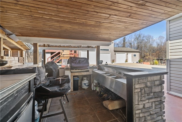 view of patio / terrace with area for grilling and exterior kitchen