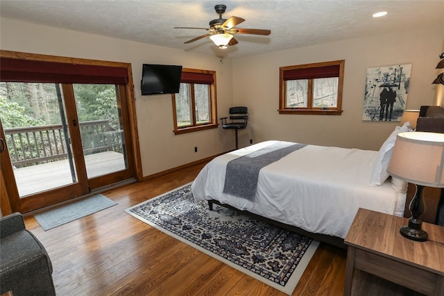 bedroom with a textured ceiling, access to outside, ceiling fan, and light hardwood / wood-style floors