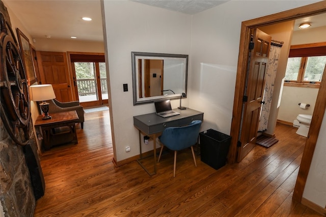 hallway featuring dark hardwood / wood-style flooring