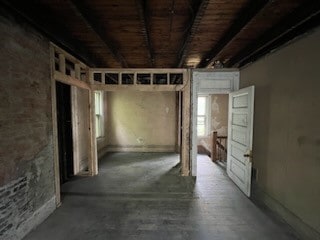 basement featuring wood ceiling