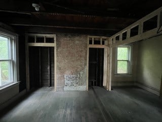 unfurnished room with wood-type flooring