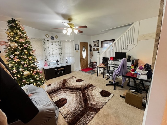 living room featuring ceiling fan and carpet floors