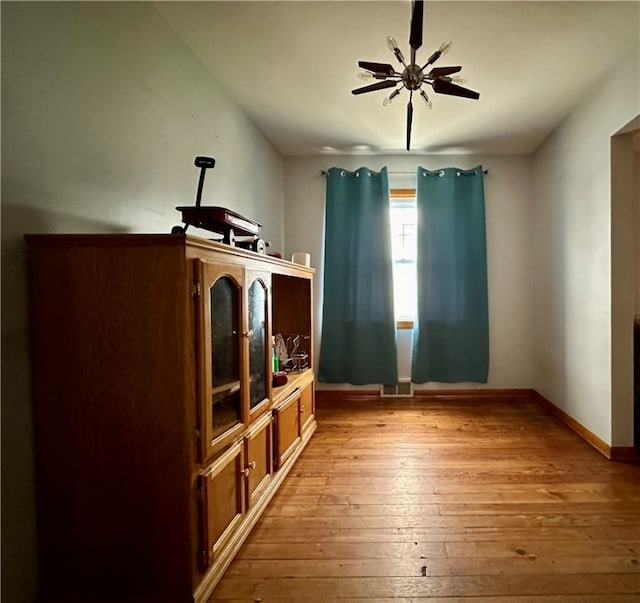 interior space featuring light hardwood / wood-style floors and ceiling fan