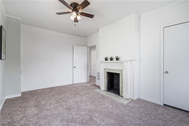 unfurnished living room featuring light carpet, ceiling fan, and crown molding