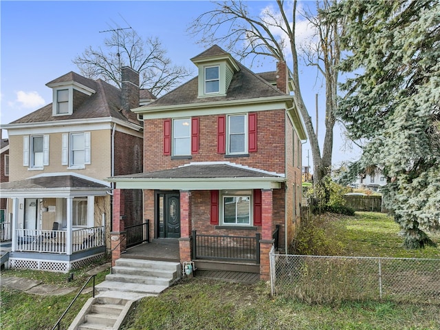 view of front of property featuring covered porch