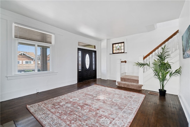 foyer featuring dark hardwood / wood-style floors