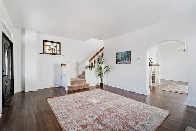 sitting room featuring dark hardwood / wood-style flooring