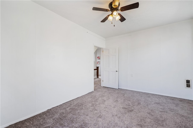 unfurnished room with carpet floors and ceiling fan