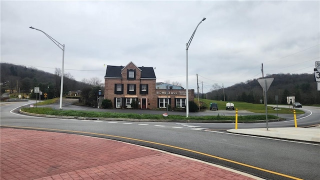 2 La Belle Vue Rd, Allegheny Twp, PA 15690 - view of asphalt road featuring traffic signs, curbs, and street lights