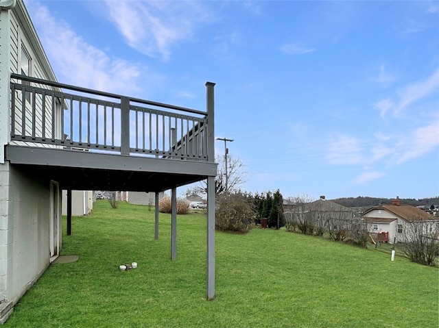 view of yard featuring a deck