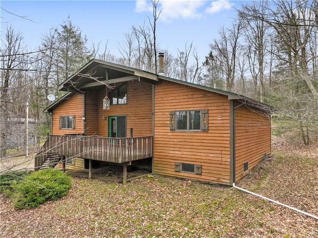 rear view of property with a deck