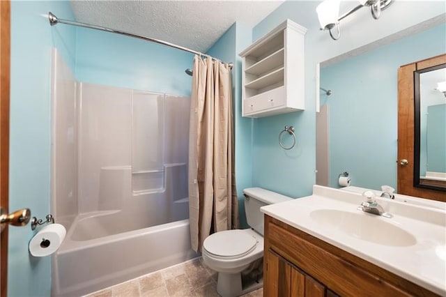 full bathroom featuring vanity, toilet, a textured ceiling, and shower / tub combo with curtain