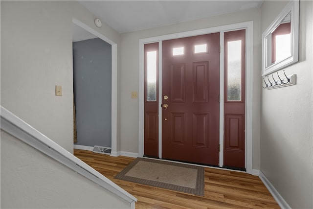 entrance foyer featuring light hardwood / wood-style floors