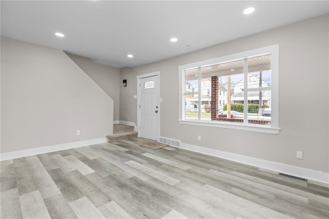 entrance foyer with light wood-type flooring