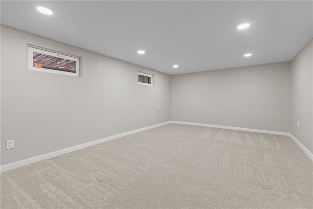 basement featuring carpet flooring