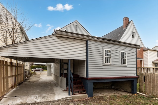 exterior space featuring a carport