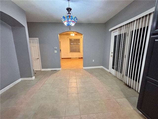 1713 W 8th St, Patterson Twp, PA 15010 - unfurnished room featuring arched walkways and baseboards