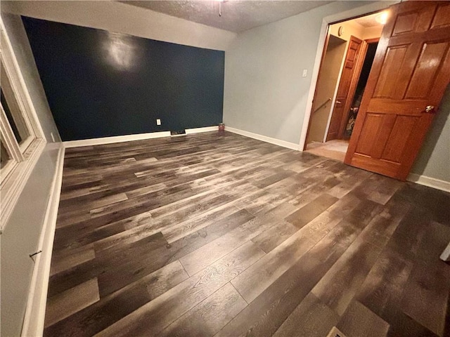 1713 W 8th St, Patterson Twp, PA 15010 - unfurnished bedroom with dark wood finished floors and baseboards