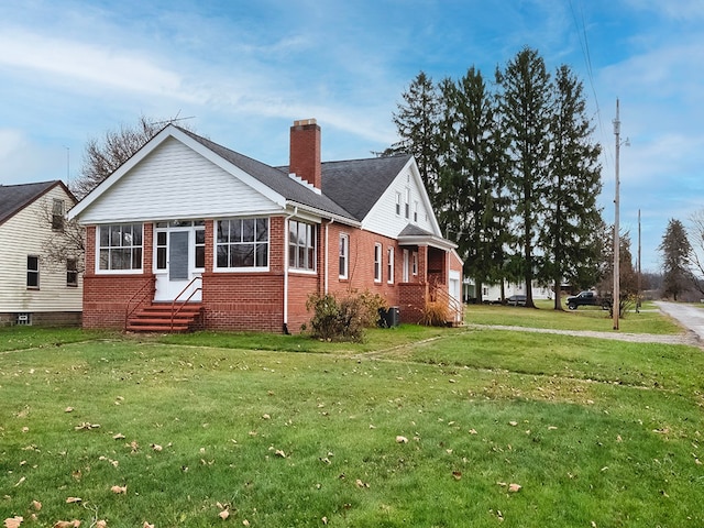 view of property exterior with a lawn