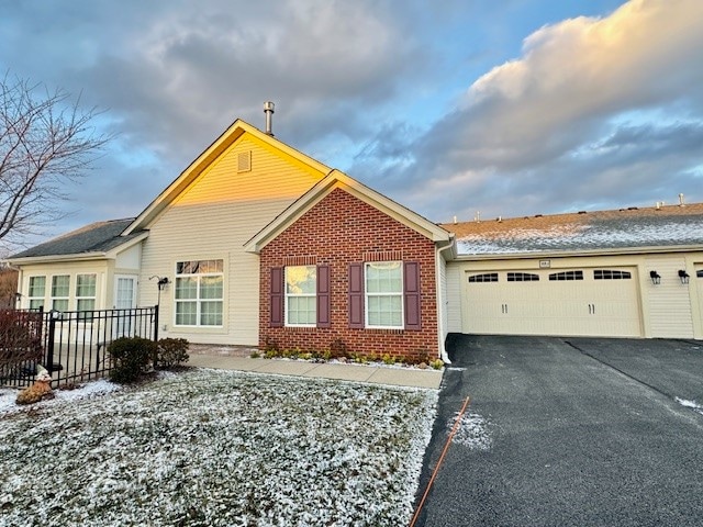 view of property exterior with a garage