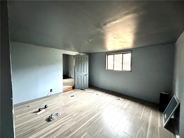 unfurnished bedroom with light hardwood / wood-style flooring