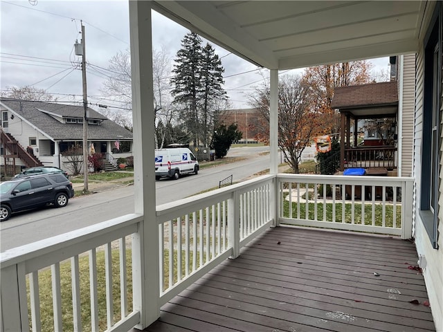 wooden terrace with covered porch