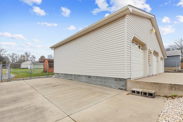 view of side of property with a garage