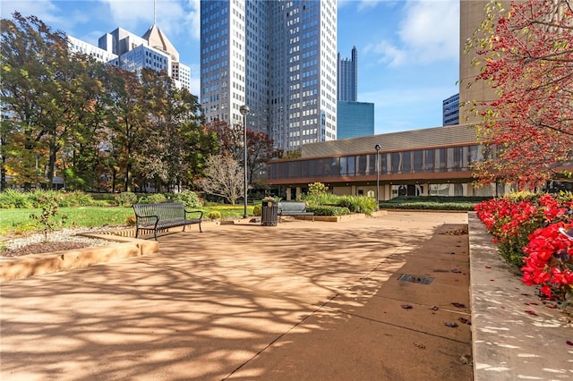 surrounding community featuring a patio