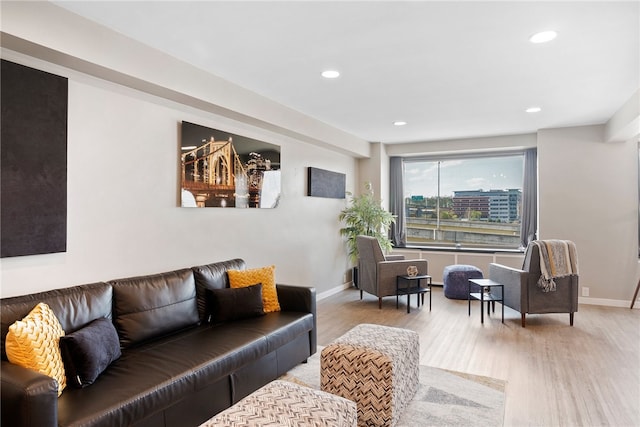 living room with light hardwood / wood-style flooring