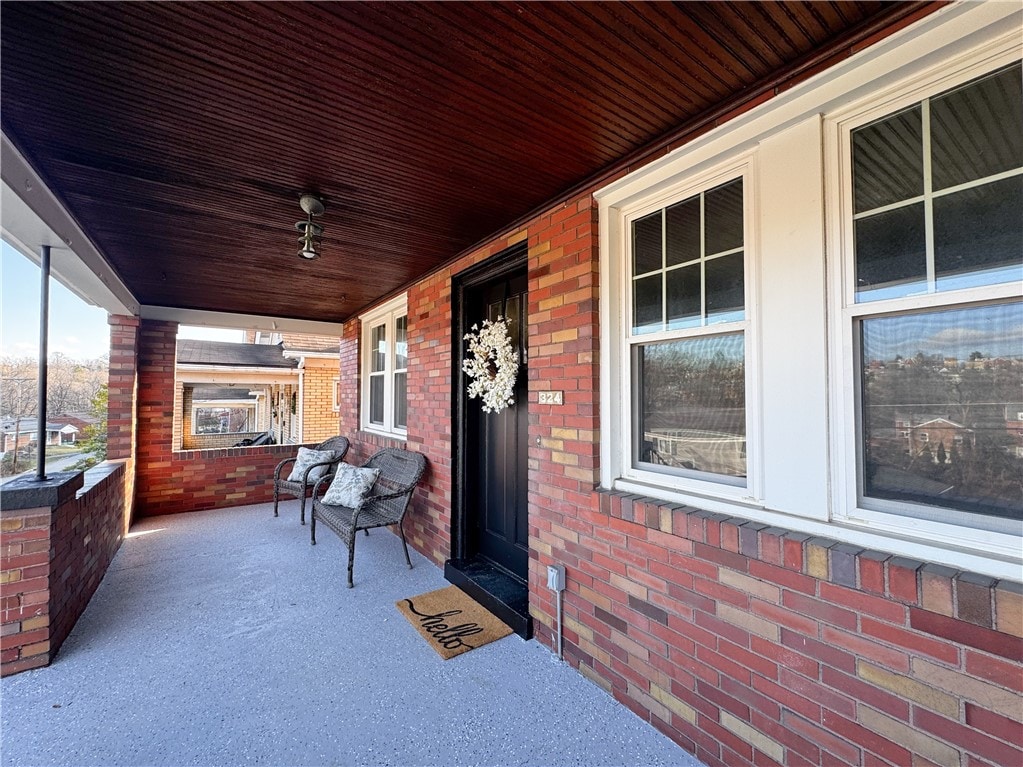 view of patio featuring a porch