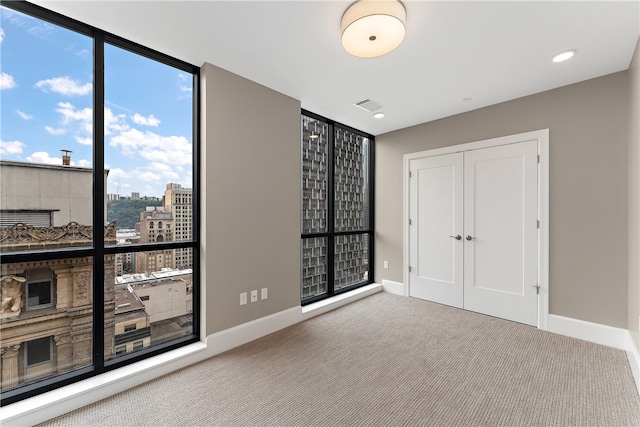 unfurnished bedroom featuring a closet and carpet