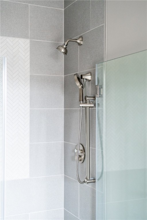 interior details featuring walk in shower