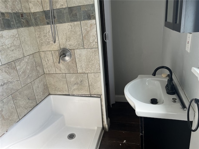 bathroom featuring sink and walk in shower