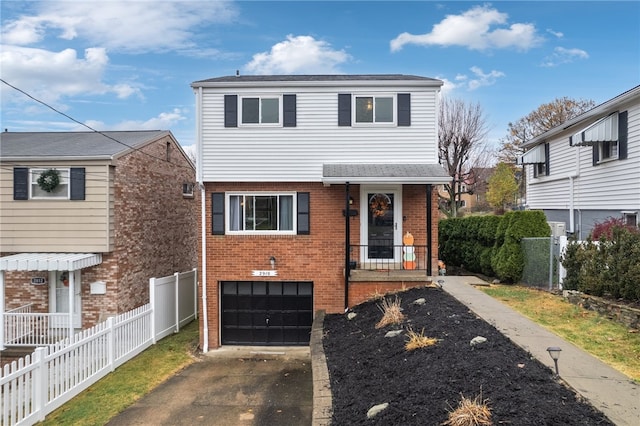 front of property with a garage