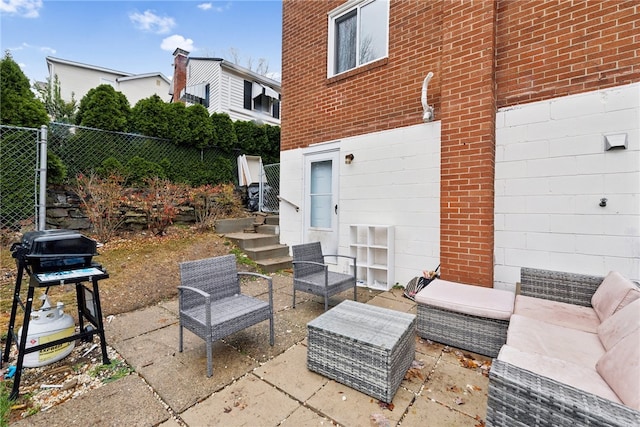 view of patio with a grill and an outdoor hangout area