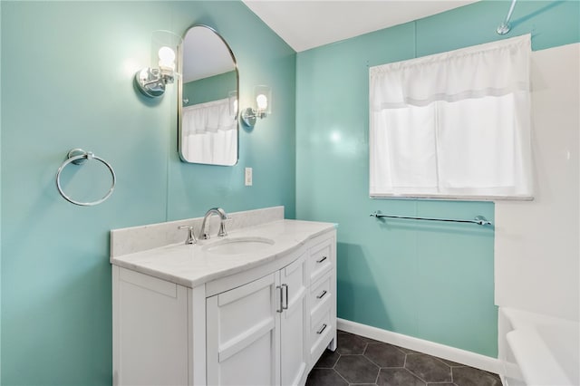 bathroom with vanity and tile patterned floors