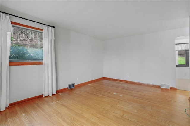 spare room with light wood-type flooring