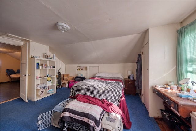 bedroom featuring dark carpet and lofted ceiling