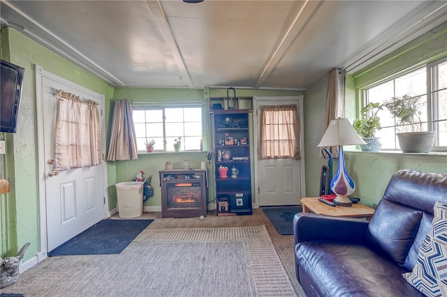 interior space with carpet flooring and vaulted ceiling