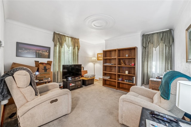 carpeted living room featuring a wealth of natural light