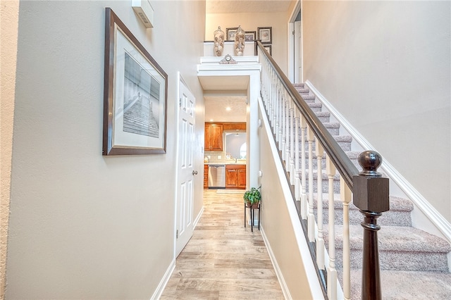 hallway featuring light hardwood / wood-style floors