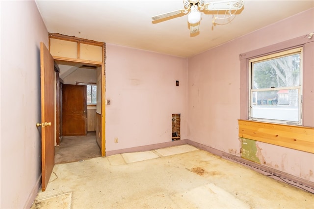 unfurnished room featuring ceiling fan