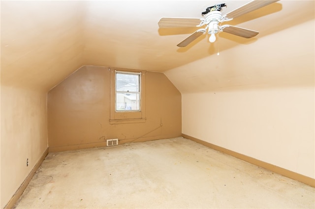 additional living space featuring ceiling fan and vaulted ceiling