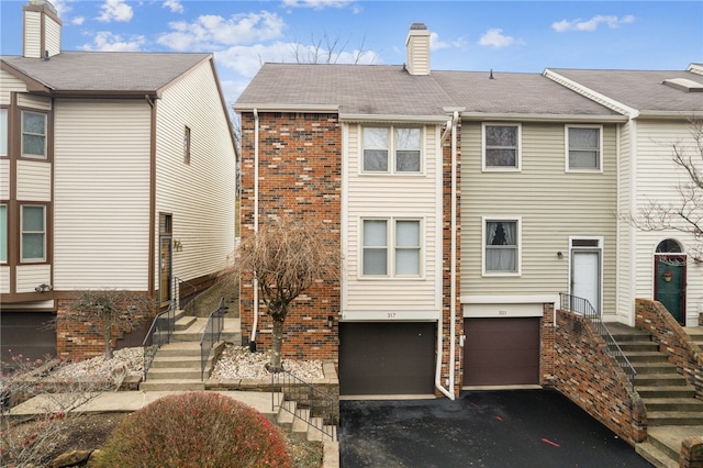 view of property with a garage