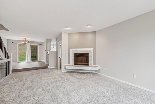 unfurnished living room with carpet