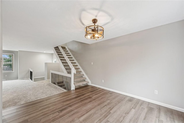 unfurnished living room with hardwood / wood-style flooring