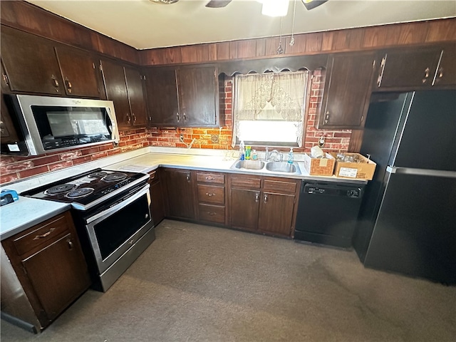 kitchen featuring dark brown cabinetry, ceiling fan, sink, and black appliances